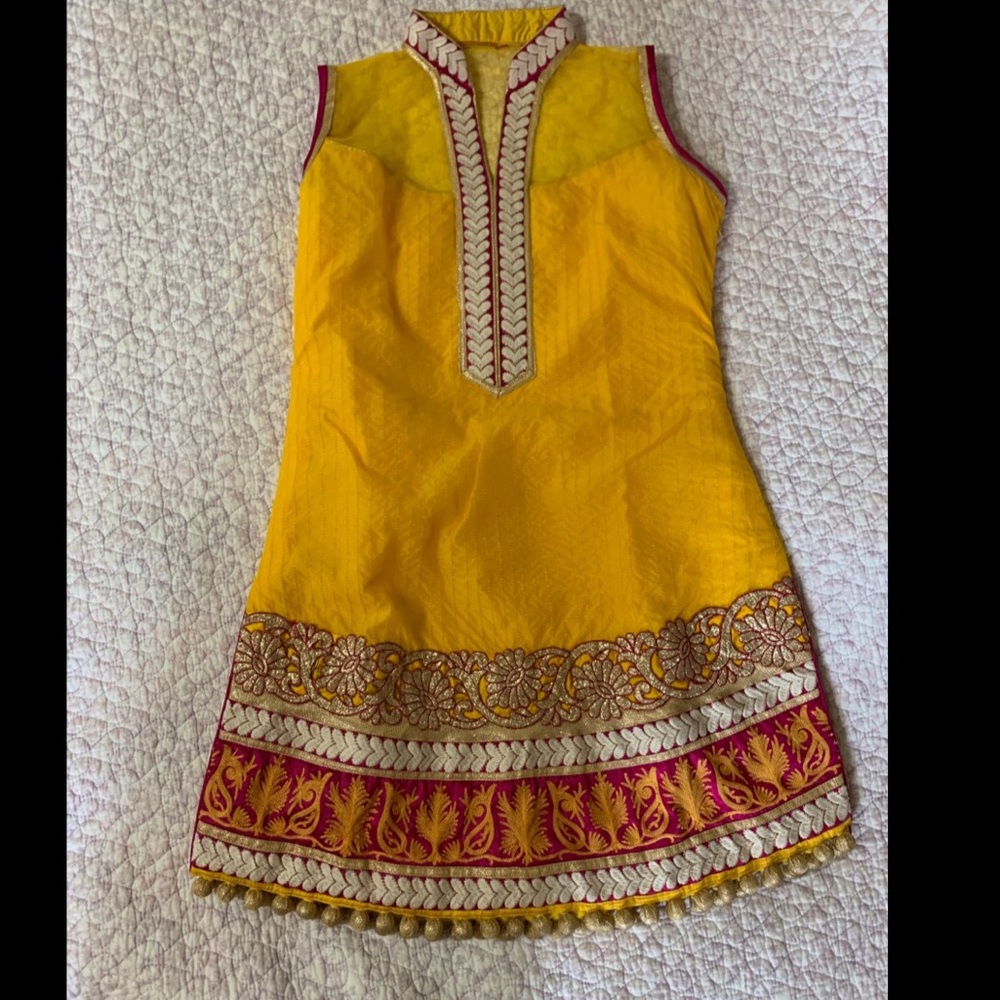 yellow sleeveless outfit